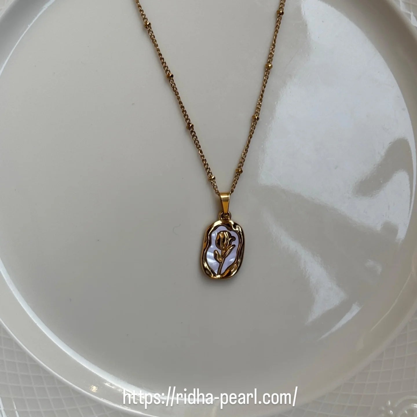 Gold plated pendant