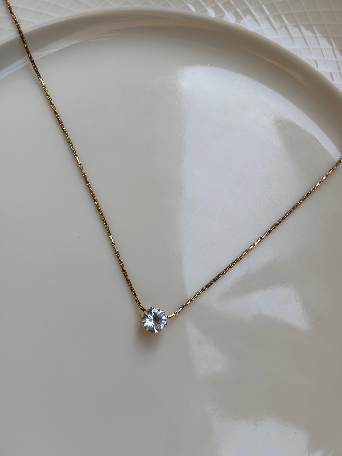 Gold plated pendant stone