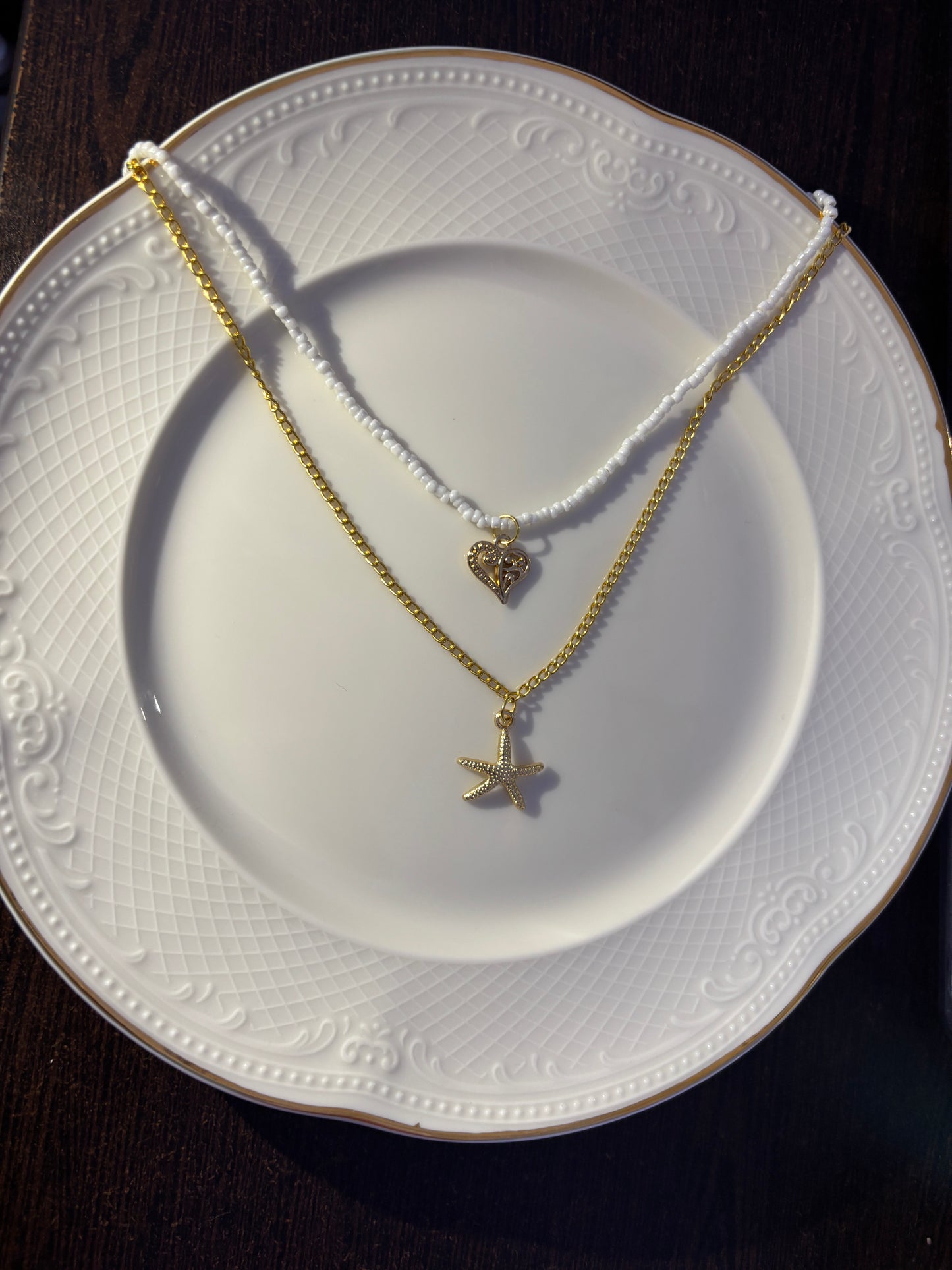 White and golden charms pendent